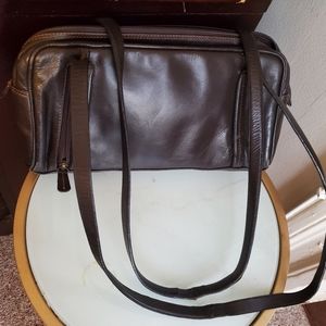 TANO dark brown genuine leather hand bag.